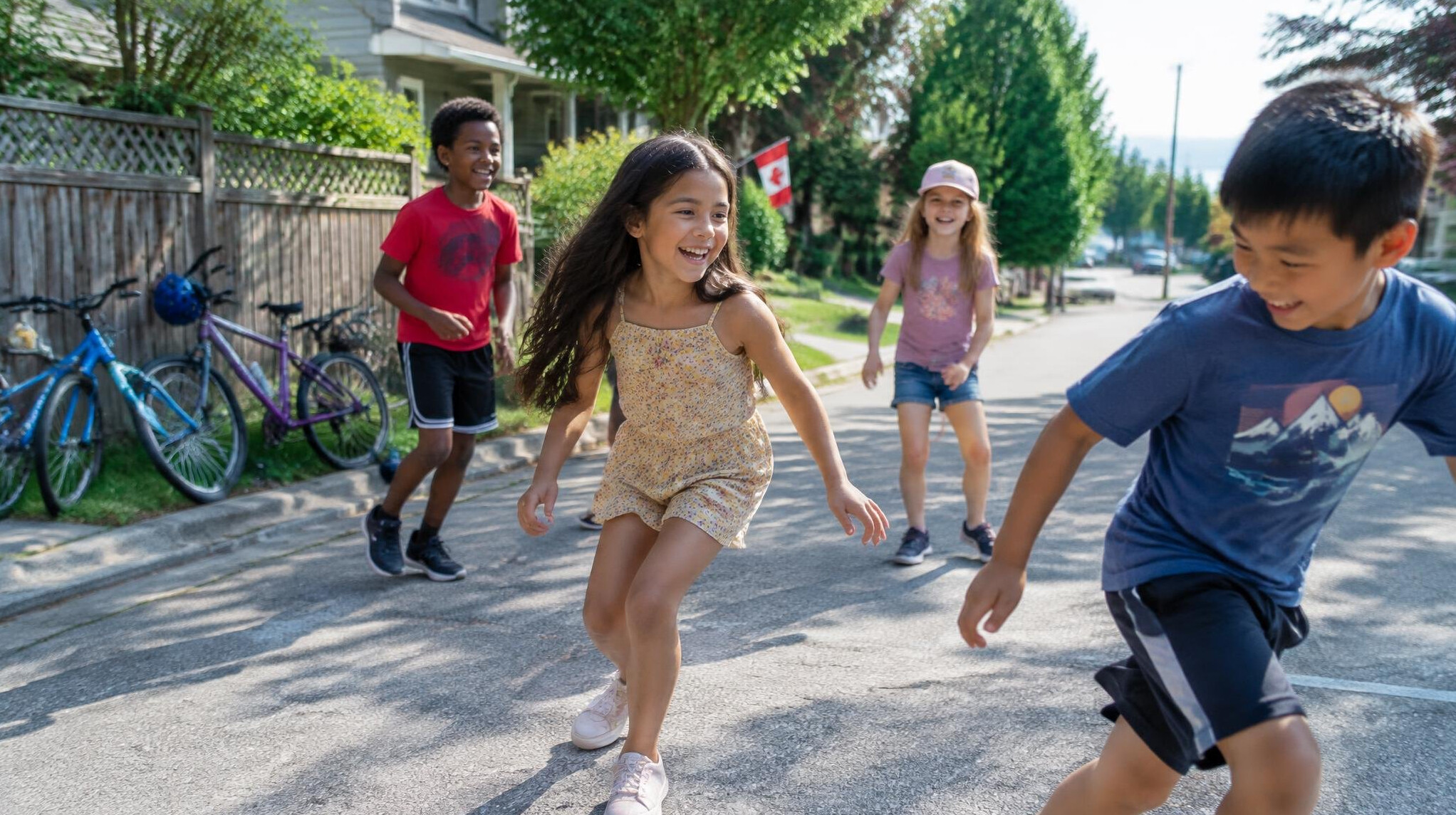 Children playing on a residential Canadian street in summer